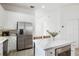 Modern kitchen with white cabinets and stainless steel appliances at 3811 Bayside Cir, Bradenton, FL 34210