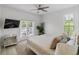Comfortable bedroom with king bed and private balcony access at 3811 Bayside Cir, Bradenton, FL 34210