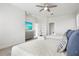 Spacious bedroom with two beds, TV, and built-in shelving at 3811 Bayside Cir, Bradenton, FL 34210