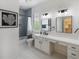 Elegant bathroom with double vanity and walk-in shower at 3811 Bayside Cir, Bradenton, FL 34210
