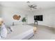 Main bedroom with king-size bed and en-suite bathroom at 3811 Bayside Cir, Bradenton, FL 34210