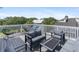 Relaxing rooftop deck with seating area and city views at 3811 Bayside Cir, Bradenton, FL 34210