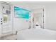 Bright bedroom with a comfortable bed and access to balcony at 3811 Bayside Cir, Bradenton, FL 34210
