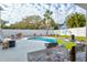 View from bar of refreshing pool and backyard at 3811 Bayside Cir, Bradenton, FL 34210