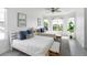 Bedroom with two twin beds and large windows at 3811 Bayside Cir, Bradenton, FL 34210