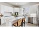 Modern kitchen with white cabinets and large island at 3811 Bayside Cir, Bradenton, FL 34210