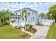 Two-story home with a gray exterior and a driveway at 3811 Bayside Cir, Bradenton, FL 34210