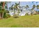 Charming two-story house with a well-manicured lawn at 3811 Bayside Cir, Bradenton, FL 34210