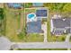 House with pool and basketball court; bird's-eye view at 3811 Bayside Cir, Bradenton, FL 34210