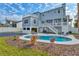 Beautiful kidney-shaped pool and home exterior at 3811 Bayside Cir, Bradenton, FL 34210