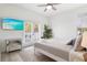 Bright bedroom with king bed, private balcony, and modern decor at 3811 Bayside Cir, Bradenton, FL 34210