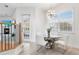 Bright breakfast nook with a glass-top table and white chairs at 3811 Bayside Cir, Bradenton, FL 34210