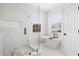 Elegant bathroom with soaking tub, marble shower and modern finishes at 3811 Bayside Cir, Bradenton, FL 34210