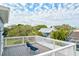 Elevated deck with white railings, offering scenic neighborhood views at 3811 Bayside Cir, Bradenton, FL 34210