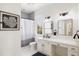 Modern bathroom with double vanity, shower, and updated fixtures at 3811 Bayside Cir, Bradenton, FL 34210