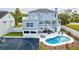 Two-story home with pool, deck, and basketball court at 3811 Bayside Cir, Bradenton, FL 34210