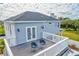Private rooftop deck with two chairs and views of the neighborhood at 3811 Bayside Cir, Bradenton, FL 34210