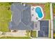 Top-down view of house, pool, and basketball court at 3811 Bayside Cir, Bradenton, FL 34210