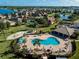 Aerial view of community pool, playground and clubhouse at 1822 Raven Glen Dr, Ruskin, FL 33570