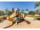 playground with a spiral slide and sandy play area at 1822 Raven Glen Dr, Ruskin, FL 33570