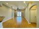 Spacious living room with hardwood floors and sliding doors to patio at 1822 Raven Glen Dr, Ruskin, FL 33570