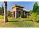 Community building with stone accents and a welcoming entrance at 1822 Raven Glen Dr, Ruskin, FL 33570