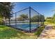 Community basketball court with chain link fence and paved surface at 1822 Raven Glen Dr, Ruskin, FL 33570