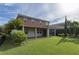 Home with covered patio and spacious backyard at 2824 Esmeralda Dr, Sarasota, FL 34243