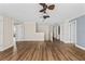 Spacious bonus room with hardwood floors and ceiling fan at 2824 Esmeralda Dr, Sarasota, FL 34243