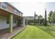 Covered patio with pavers and access to backyard at 2824 Esmeralda Dr, Sarasota, FL 34243
