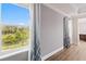 Bedroom with water views and gray accent wall at 2824 Esmeralda Dr, Sarasota, FL 34243