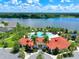 Resort-style pool with clubhouse and playground, offering a luxurious community amenity at 5827 Mezzana Run, Palmetto, FL 34221