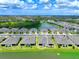 Aerial view of the house and surrounding community at 5827 Mezzana Run, Palmetto, FL 34221