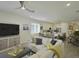 Spacious living room with open floor plan and comfortable seating at 5827 Mezzana Run, Palmetto, FL 34221
