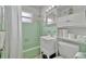 Clean bathroom, complete with toilet, shower, and vanity at 21403 Glendale Ave, Port Charlotte, FL 33952