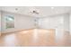 Bright and airy bedroom with light wood-look tile floors at 2491 Hawthorne St, Sarasota, FL 34239