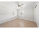 Spacious bedroom featuring wood-look floors, and dual closets at 2491 Hawthorne St, Sarasota, FL 34239