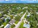 Wide aerial view of the house and surrounding neighborhood at 2491 Hawthorne St, Sarasota, FL 34239