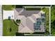 Bird's eye view showing the house layout, pool, and surrounding landscape at 10268 Alexandria Ave, Englewood, FL 34224