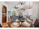 Bright dining area with hardwood floors, and views to living room at 10268 Alexandria Ave, Englewood, FL 34224