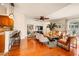 Bright living room with hardwood floors and comfortable seating at 10268 Alexandria Ave, Englewood, FL 34224