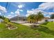 Spacious backyard with a screened pool and patio area at 10268 Alexandria Ave, Englewood, FL 34224