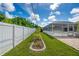 Backyard with a pool, patio, and lush landscaping at 10268 Alexandria Ave, Englewood, FL 34224