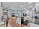 Modern kitchen with white cabinets and granite countertops at 164 Avens Dr, Nokomis, FL 34275