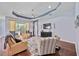 Spacious living room with hardwood floors and a view to the backyard at 164 Avens Dr, Nokomis, FL 34275