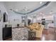 Open concept living room with a view of the kitchen at 164 Avens Dr, Nokomis, FL 34275