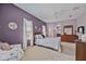 Comfortable bedroom with ensuite access and plenty of closet space at 164 Avens Dr, Nokomis, FL 34275