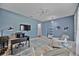 Bright home office features built-in shelving and hardwood floors at 164 Avens Dr, Nokomis, FL 34275