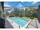 Enjoy this refreshing screened pool with spacious patio area at 164 Avens Dr, Nokomis, FL 34275