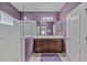 Elegant bathroom with double vanity, large mirror, and glass shower at 164 Avens Dr, Nokomis, FL 34275